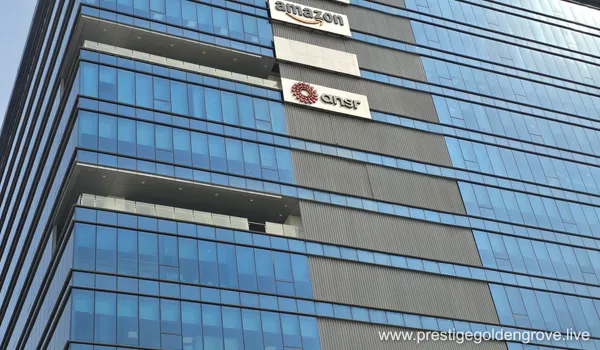 Employment Hubs and Global Companies of the GAR Infobahn building near Prestige Golden Grove, displaying logos for multinational companies including Amazon, PepsiCo, Conduent, IntouchCX, and Capgemini.
