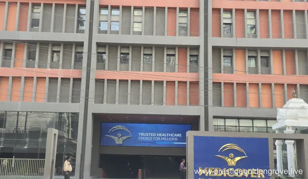 Exterior view of Medicover Hospital, a major healthcare facility located near the Prestige Golden Grove luxury apartment project in Velimela, Hyderabad.