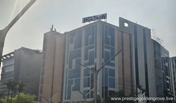 The modern HCLTech corporate office in the Gachibowli IT corridor, located within a short commute from the Prestige Golden Grove residential project in Tellapur.
